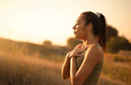 a girl deep breath in sunlight
