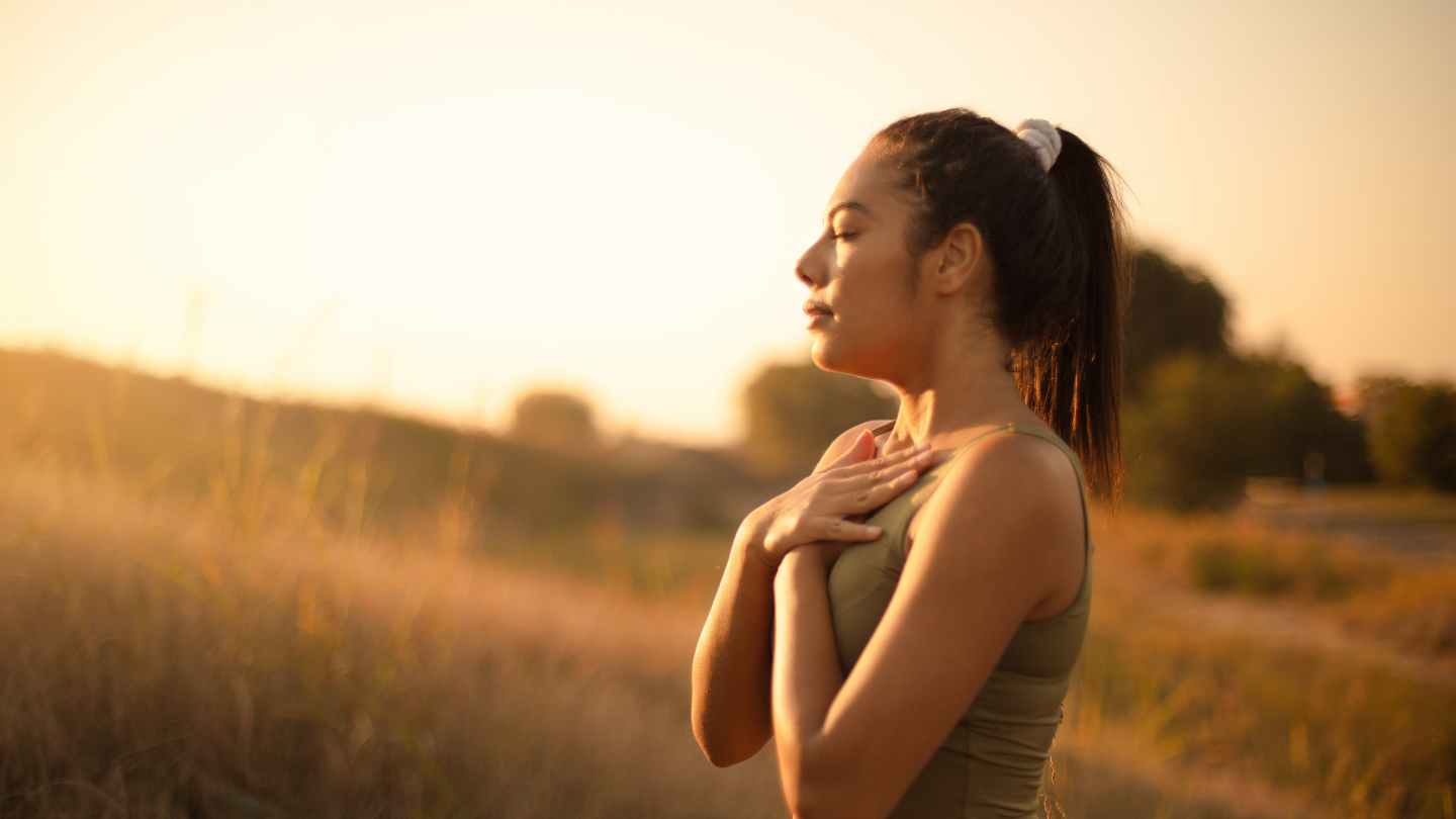 a girl deep breath in sunlight